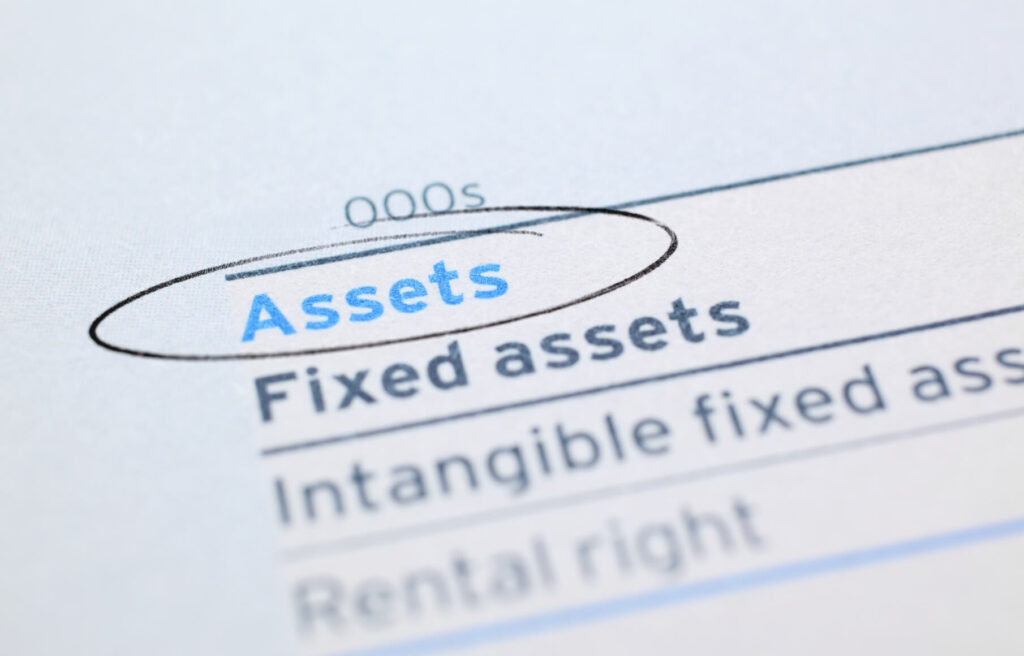 Paperwork with the word assets circled